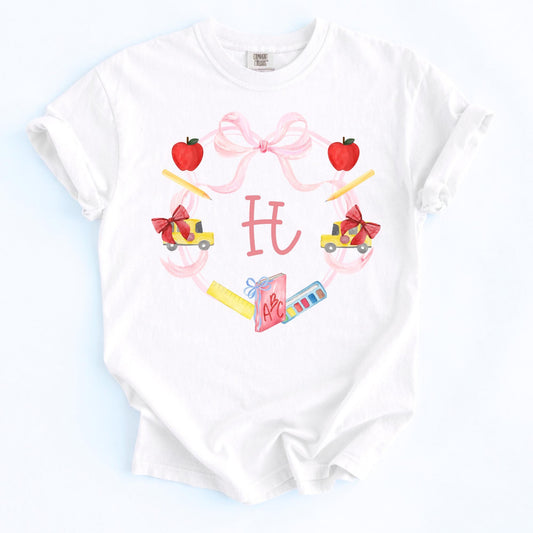 Personalized Monogram Shirt Girl Custom Initial Letter Back To School Outfit Youth Tshirt School Supply Wreath Pattern Apples Pencils Crayons School Bus Design Pink Bow Accent First Day School Wear Elementary Student Gift Soft Cotton
