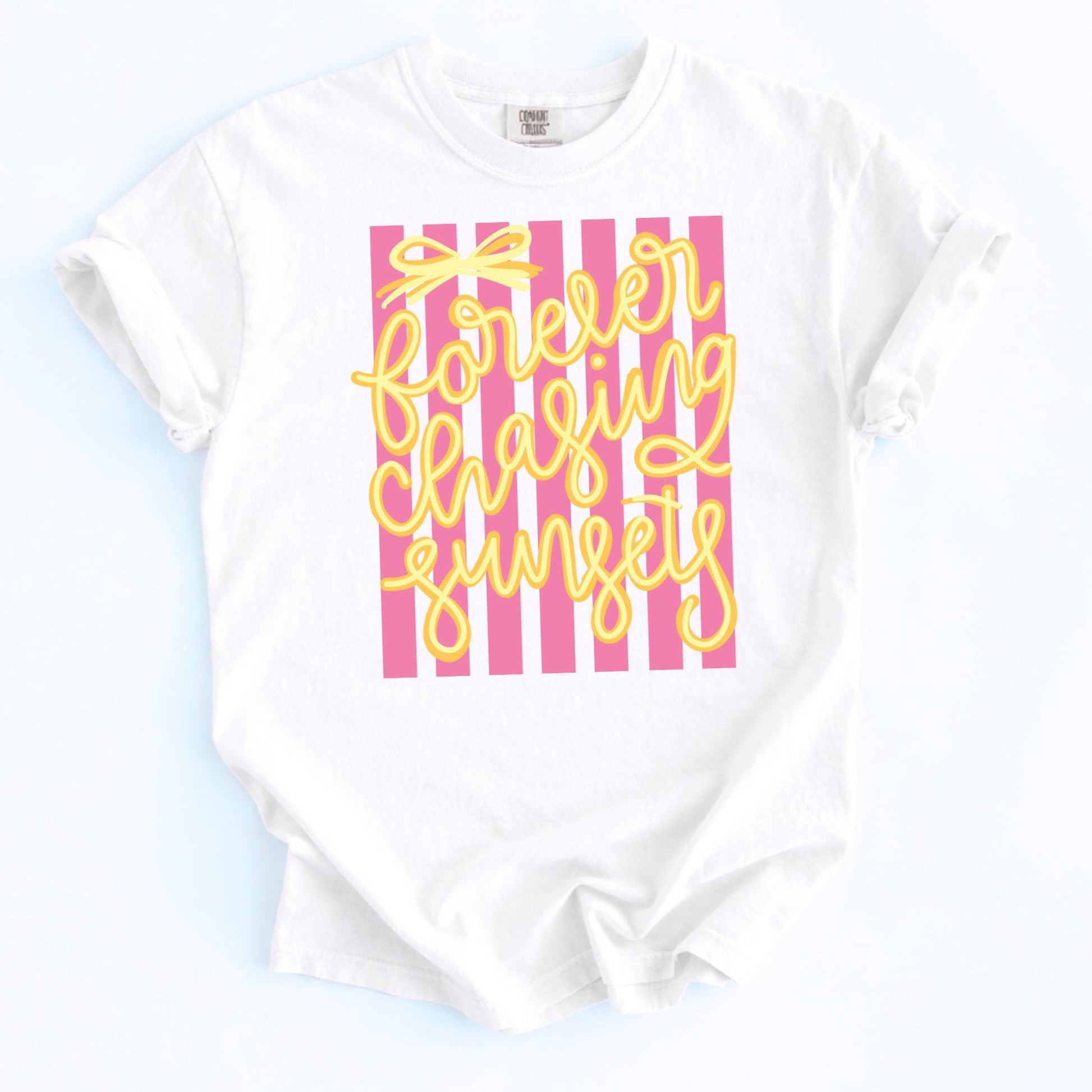 Forever Chasing Sunsets Shirt Retro Beach Tee Vintage Graphic Design Seventies Summer Fashion Pink White Striped Pattern Yellow Script Lettering Coastal Vacation Shirt Comfort Colors Fabric Soft Cotton Blend Relaxed Casual Fit Beach