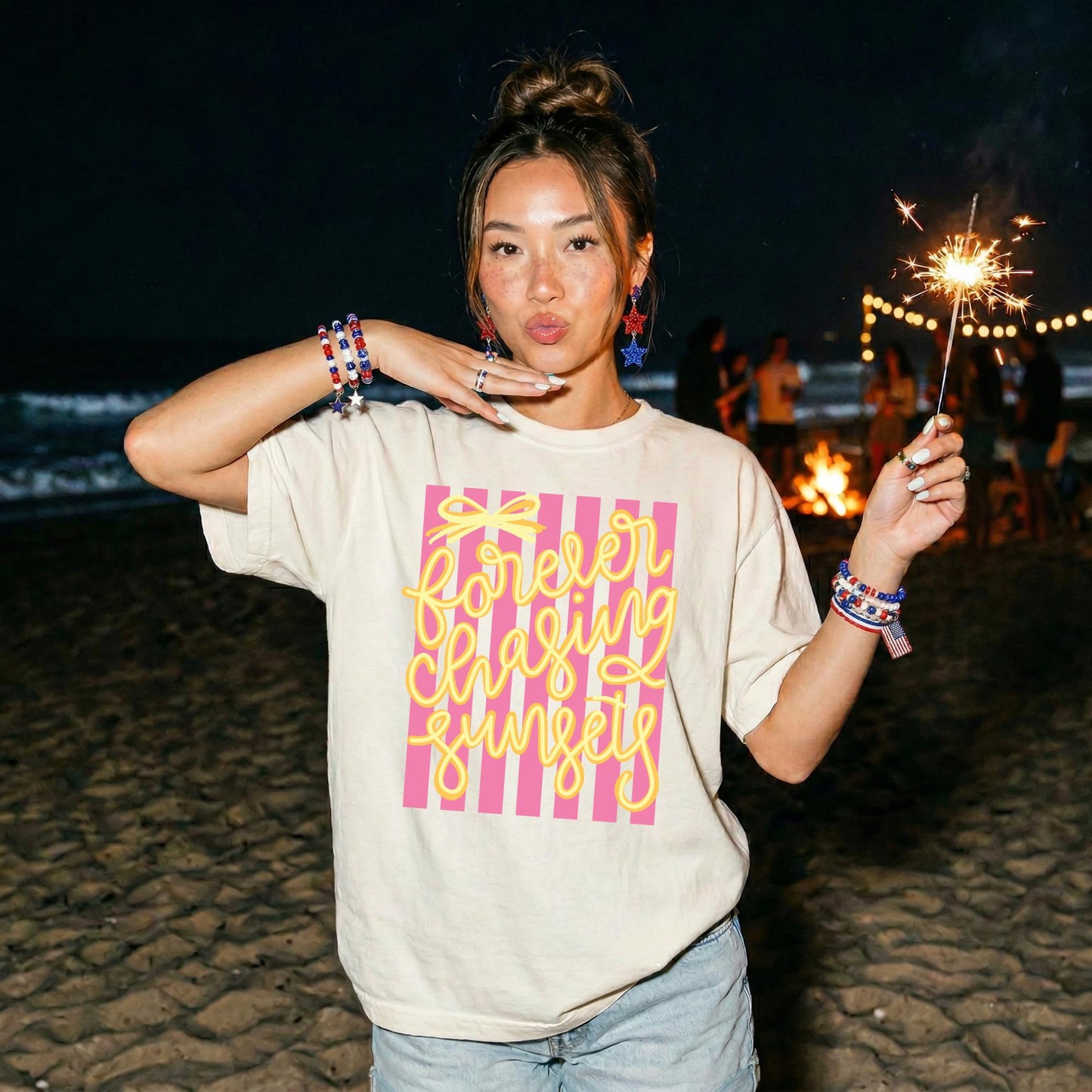 Beach Vacation Graphic Shirt Retro Sunset Tee Vintage Summer Apparel Seventies Striped Design Yellow Cursive Forever Chasing Sunsets Text Pink White Stripe Pattern Coastal Lifestyle Shirt Comfort Colors Cotton Soft Relaxed Fit Casual Beach