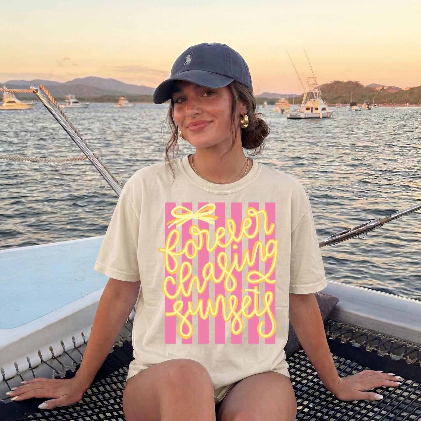 Retro Beach Vacation Tee Vintage Sunset Graphic Shirt Seventies Striped Design Forever Chasing Sunsets Text Yellow Script Lettering Pink Stripe Pattern Coastal Vibes Apparel Summer Travel Shirt Comfort Colors Cotton Soft Relaxed Fit Beach