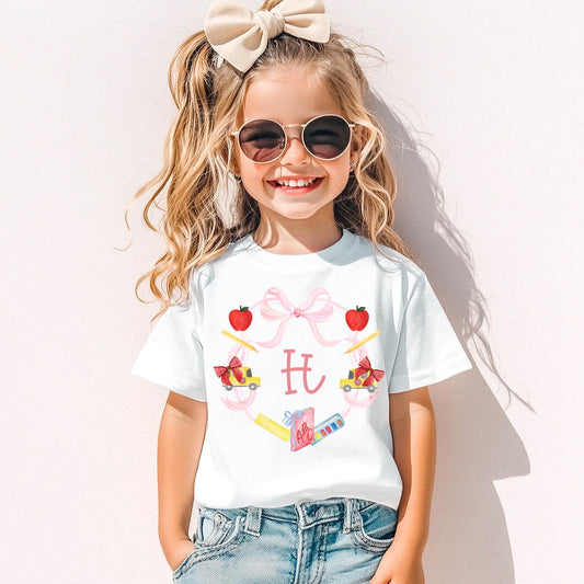 Back To School Shirt Girl Personalized Monogram Gift Custom Student Present First Day School Outfit Elementary Classroom Wear Youth Tshirt Soft Cotton Comfort Colors School Supply Wreath Design Apples Pencils Crayons School Bus Pink Bow