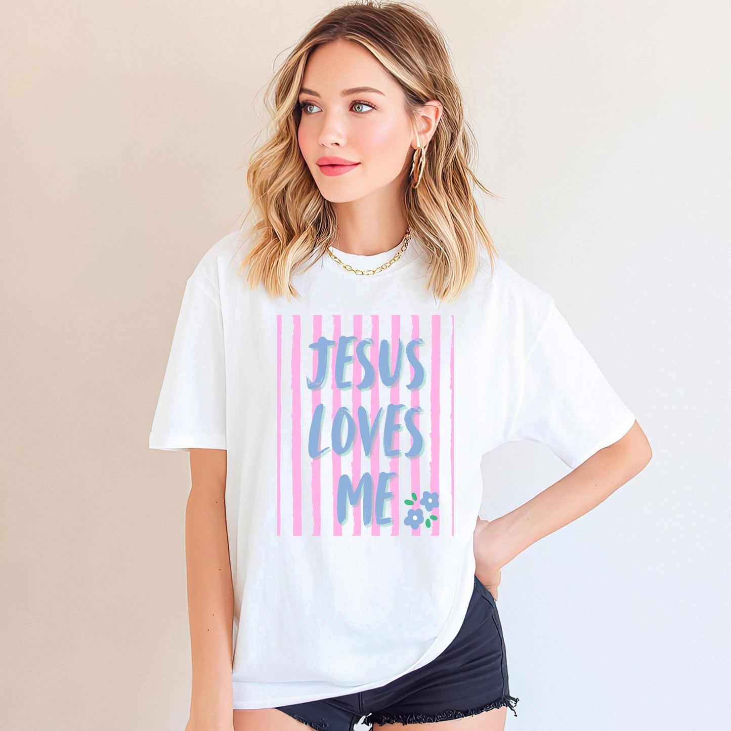 Jesus Loves Me Shirt Christian Graphic Tee Women Faith Based Apparel Religious Clothing Top Inspirational Message Scripture Design Gradient Blue Purple Text Pink Stripe Pattern Floral Accent Detail Premium Cotton Comfort Fabric Church