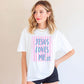 Jesus Loves Me Shirt Christian Graphic Tee Women Faith Based Apparel Religious Clothing Top Inspirational Message Scripture Design Gradient Blue Purple Text Pink Stripe Pattern Floral Accent Detail Premium Cotton Comfort Fabric Church