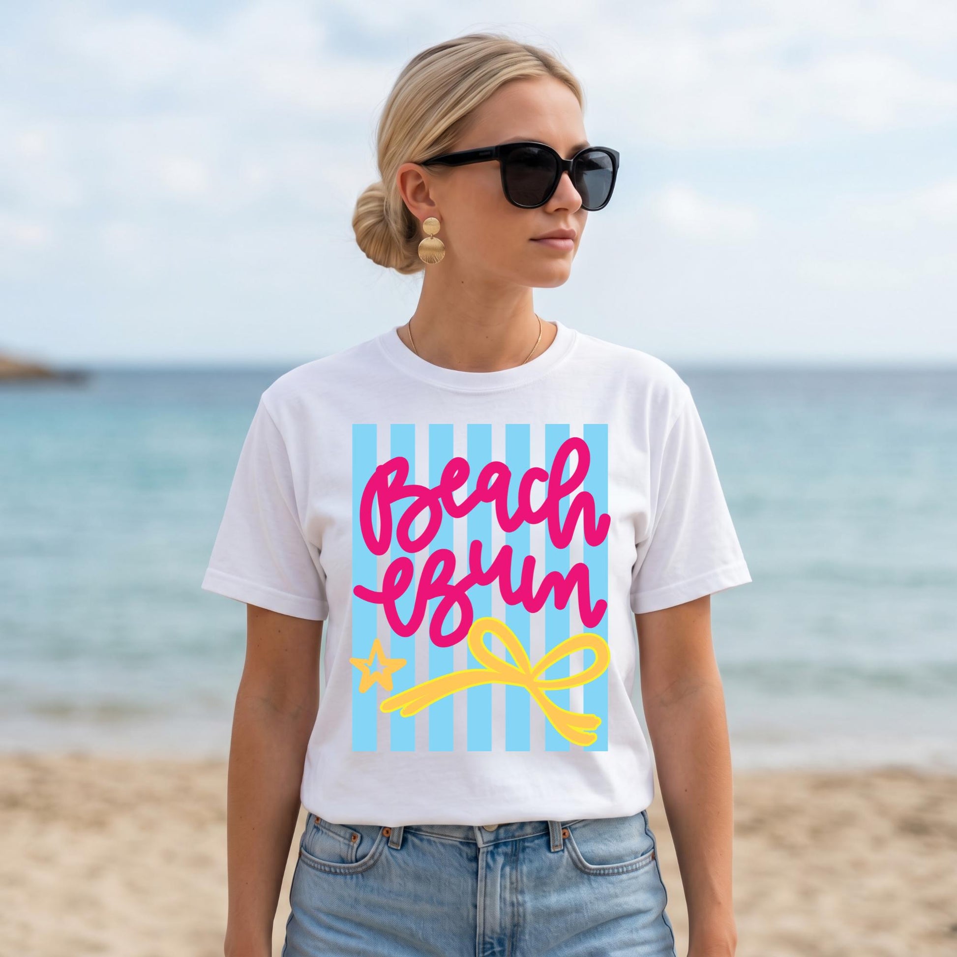 Beach Vacation Shirt Women White Graphic Tee Summer Resort Wear Pink Script Beach Bum Lettering Blue Striped Design Yellow Bow Accent Casual Outfit Tropical Travel Clothing Cruise Apparel Poolside Outfit Coastal Trip Essential Soft