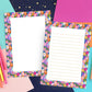Christian Stationery Paper Floral Border Design Faith Themed Writing Sheets Navy Blue Background White Cross Accents Botanical Flower Border Pink Orange Purple Blue Flowers Green Leaves Premium Quality Paper Perfect Church Communication