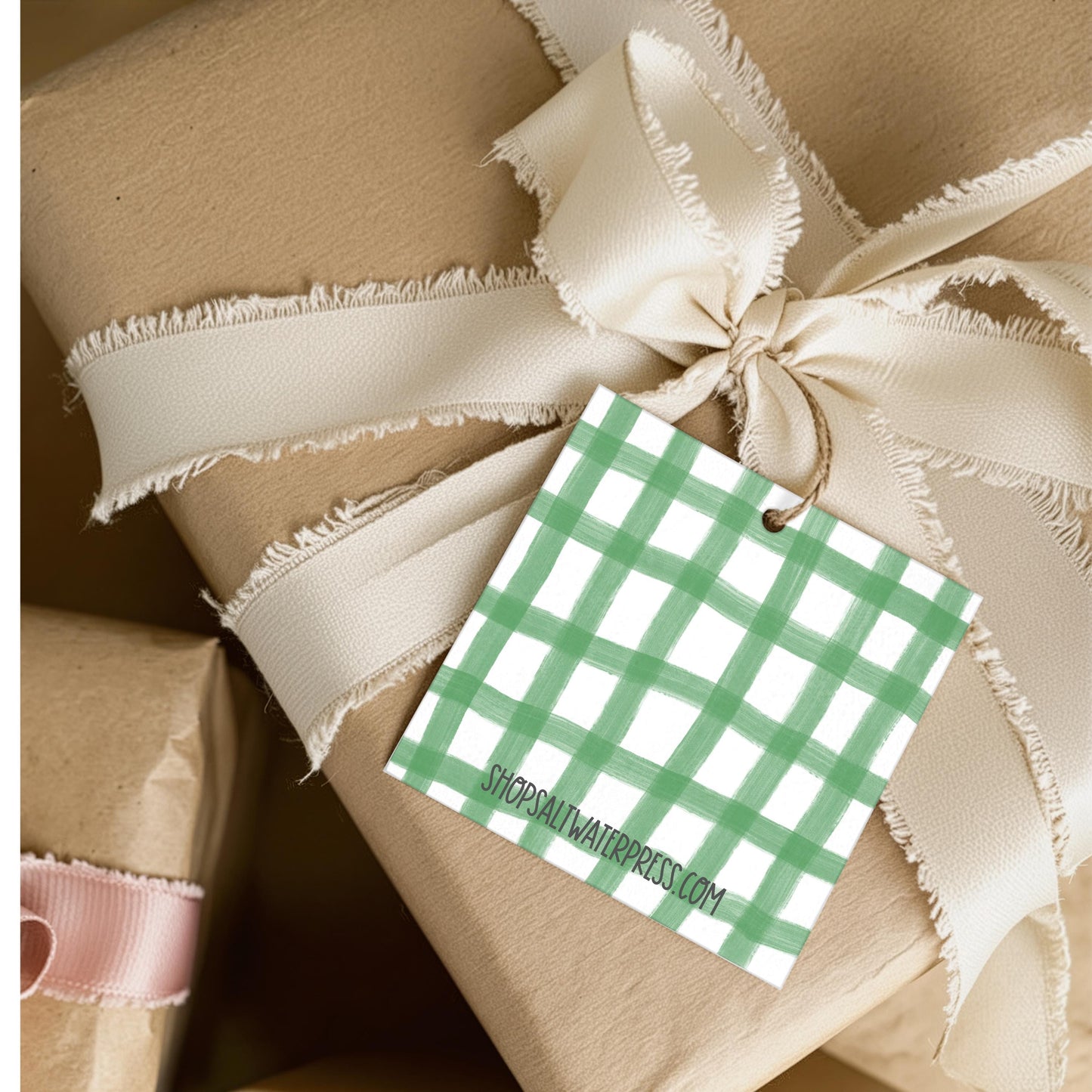 Vintage Holiday Gift Tag Farmhouse Christmas Boot Design Green Gingham Plaid Background Festive Present Tag Cottage Core Christmas Tag Rustic Cardstock Tag Evergreen Branches Berries Striped Ribbon Bow Scalloped Border Gift Wrap Accessory